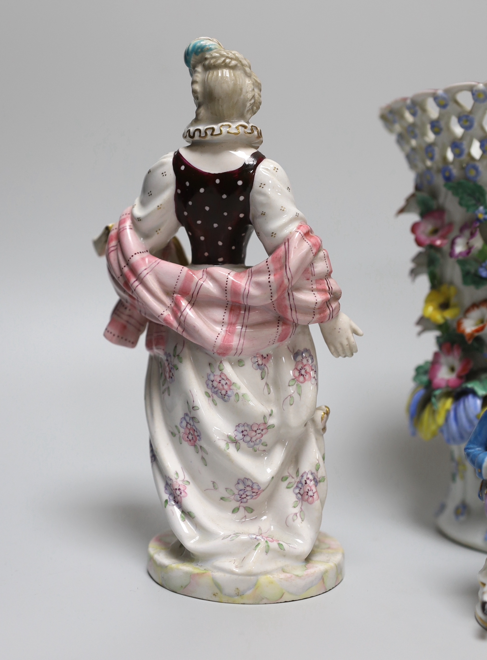 A 19th century German figure of a girl, 19cm, Vienna-type female figure, German figure of a boy and similar figure group, a continental coffee pot and an encrusted vase, the largest 18cm high
